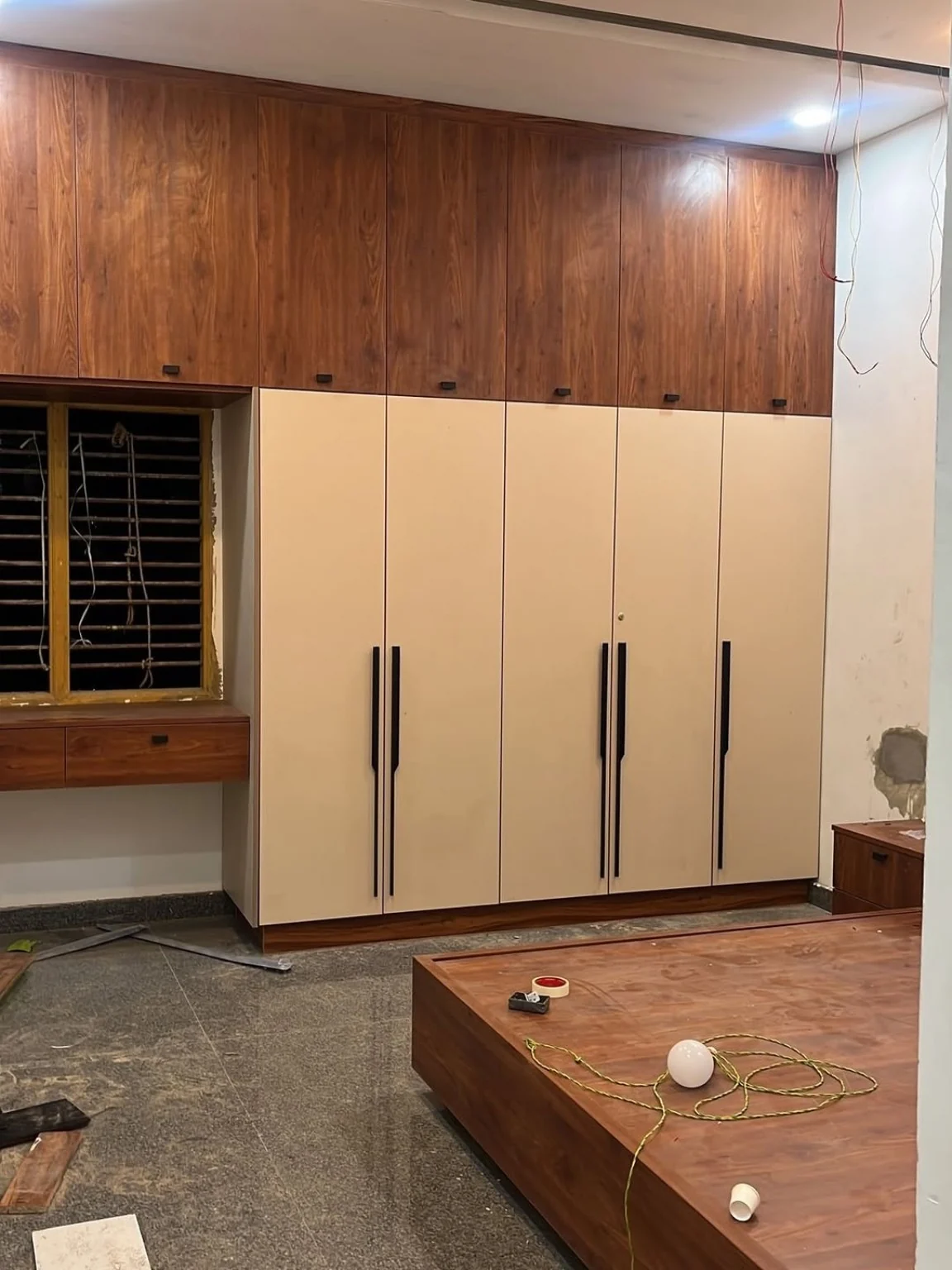 Warm-finish wardrobe and bedroom storage