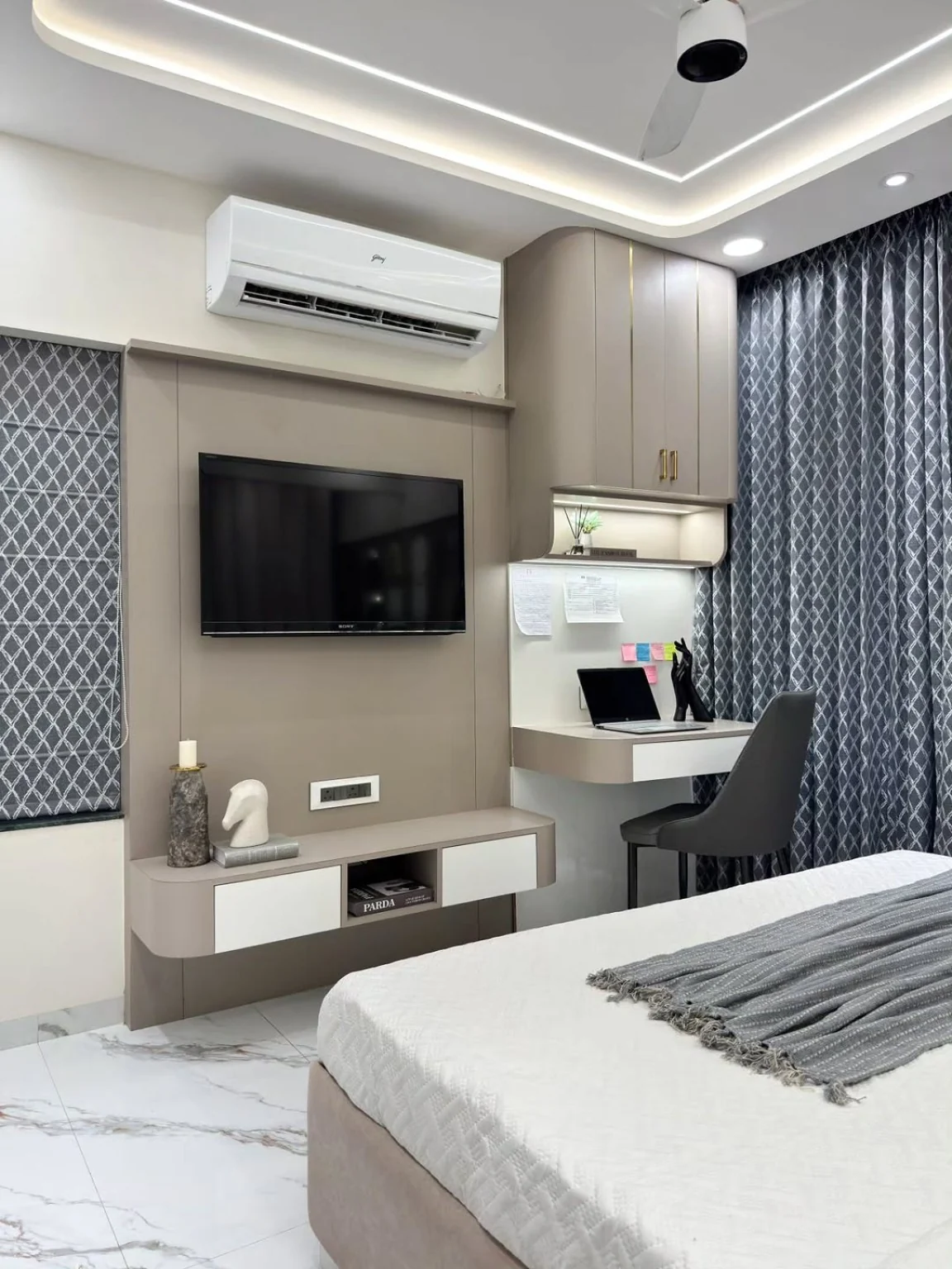 Elegant bedroom storage with illuminated shelves