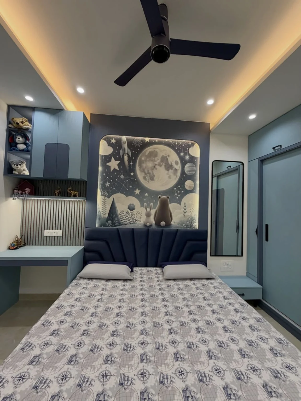 Modern bedroom with TV panel and workstation