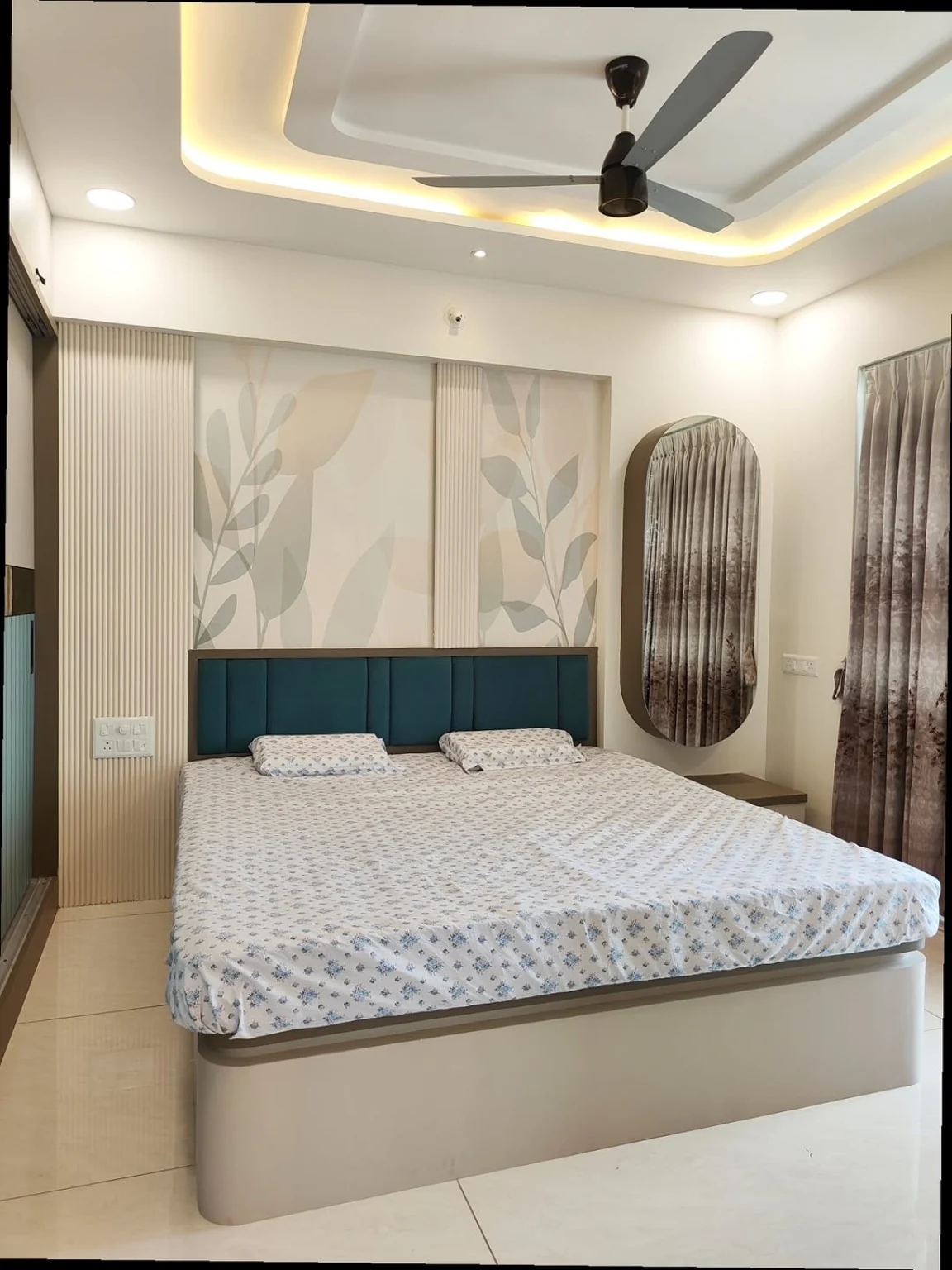 Compact bedroom interior with built-in furniture